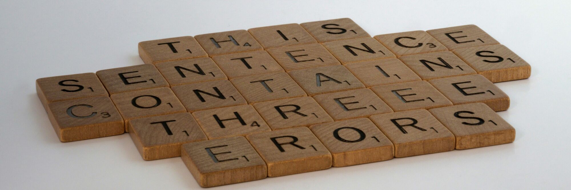 errors Scrabble: This sentence contains three errors